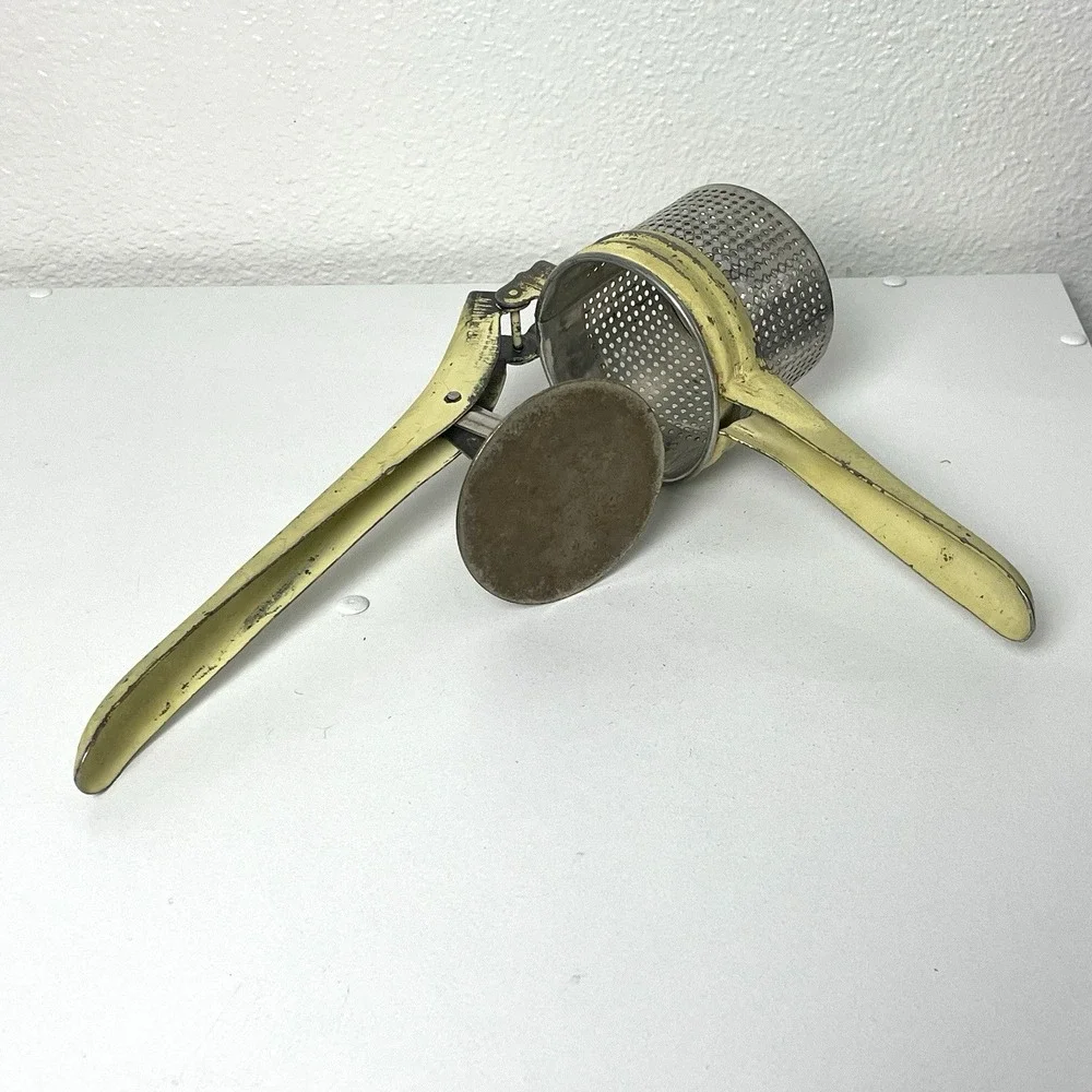 Vintage Potato Ricer Yellow Handle Metal Unmarked Made in USA